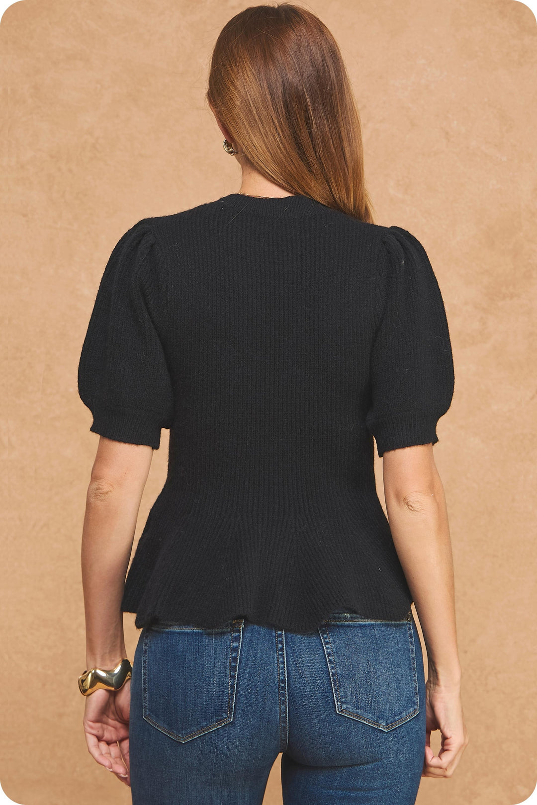 Nora peplum sweater in black