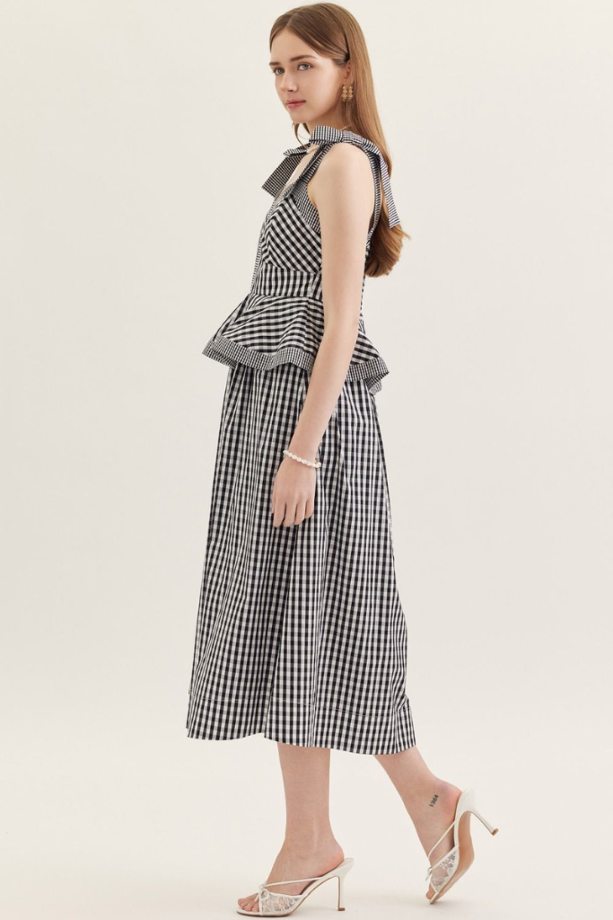 Linden peplum midi in black